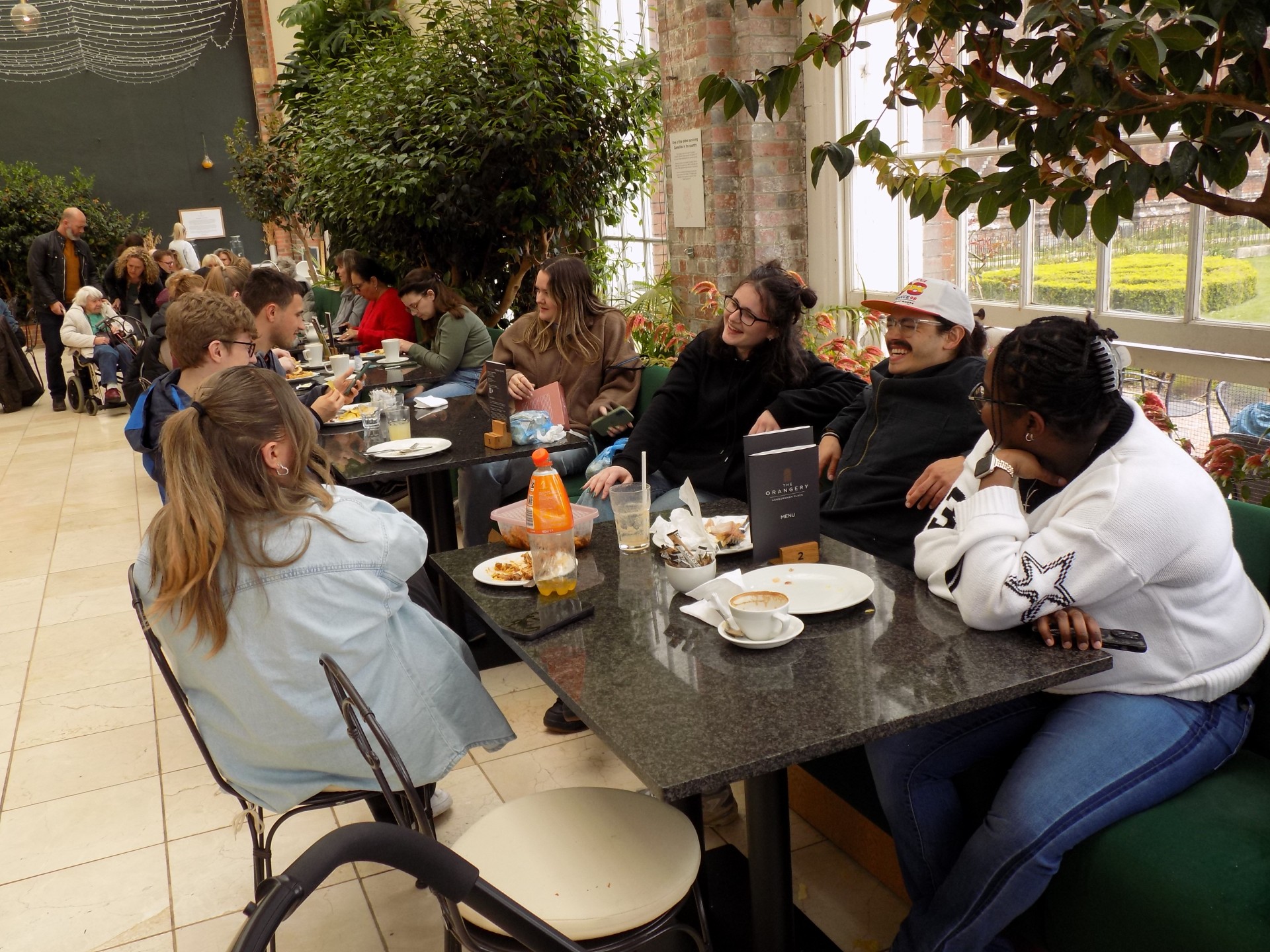 Young adults eating together